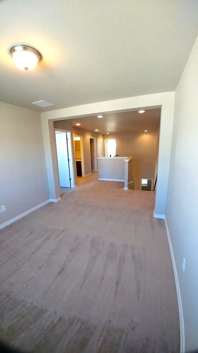 Upstairs loft bonus room flexible space for office playroom or den
