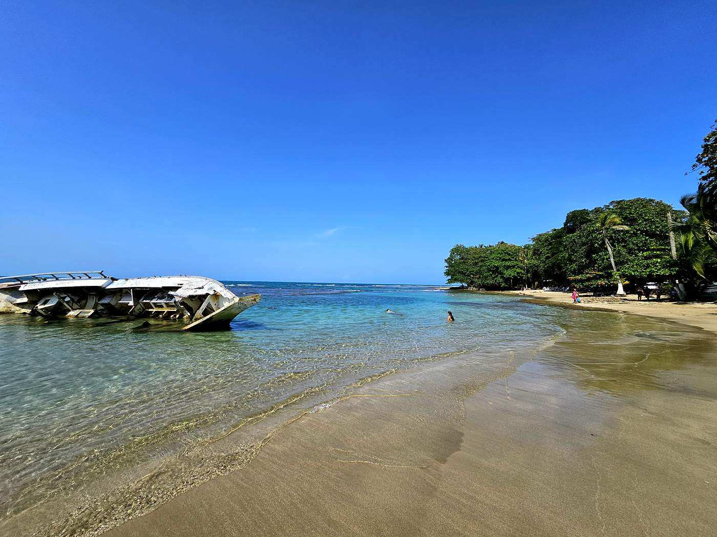 Nearby Playa Negra with turquoise Caribbean water and palm trees