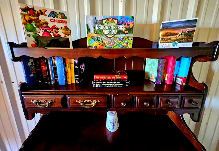 Game room shelving with board games and entertainment