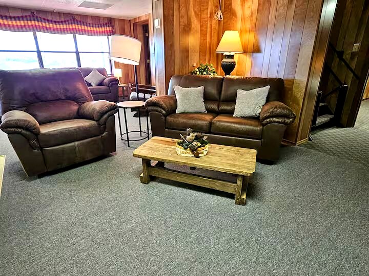 Living room with leather sofa set and coffee table